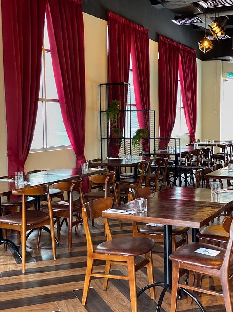 Le Gourmandin restaurant interior with classic French bistro decor