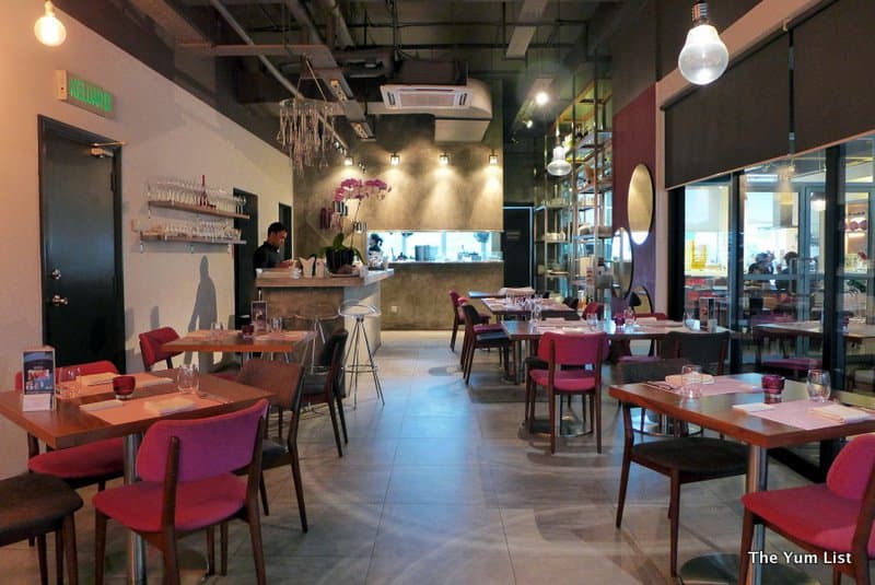 Nathalie Gourmet Studio's elegant plating and colorful macarons